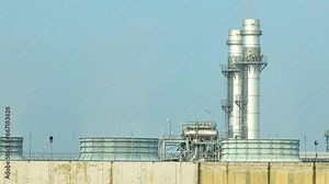 Captured from the skies, a cutting-edge power plant showcases sleek, futuristic design, merging function with aesthetics. Energy production hub: Power plants. Electricity generation centers. 4K HDR.