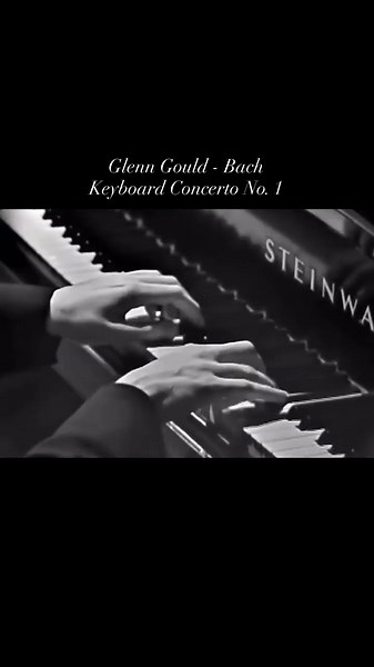 Glenn Gould performs with the New York Philharmonic Orchestra and the conductor, Leonard Bernstein