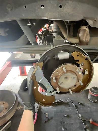 Handbrake spring hack for stubborn springs