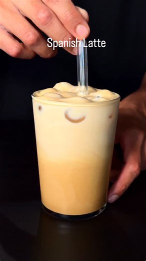 Adrian Ccopa on Instagram: "Spanish Latte ☕️🥛This delightful drink combines the sweetness of condensed milk and richness of double espresso flavor. Mix with ice cubes to taste for a really refreshing experience 🧊 A recipe that only takes 3 simple ingredients and less than 5 minutes :) Ingredients: - Condensed Milk ( 2 tbsp ) - Double shot of espresso - Ice - Milk Please follow me & share my work for more Coffee Content :) @adriaccopa . . . . #espresso #homebarista #coffeeholic #espressomachine