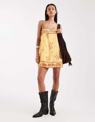 Free People bali take you with me mini slip dress in yellow combo | ASOS