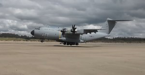 Watch an Airbus A400M land on a beach