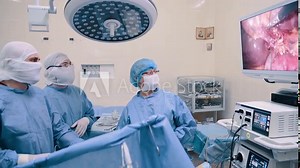 Video endoscopic surgery. A surgeon performs an operation to remove the gallbladder in the clinic.
