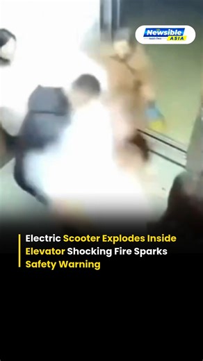 Newsible Asia on Instagram: "A terrifying incident captured on camera shows a Chinese electric scooter suddenly bursting into flames inside a residential elevator, filling the confined space with fire and smoke within seconds. Experts warn that lithium battery fires can ignite without warning and spread rapidly, especially in enclosed areas like lifts. Authorities and safety specialists are urging people not to take e-scooters or lithium-battery powered vehicles inside elevators due to the serio