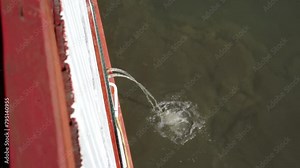 View of the lake water from the boat in the middle of the lake