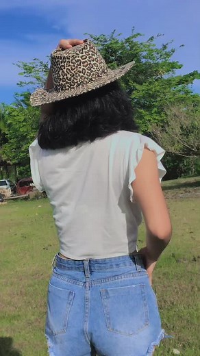 Stylish Outdoor Fashion with Floral Crop Top and Denim