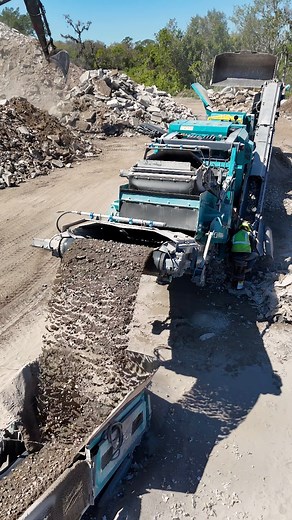 Check out the Powerscreen Trakpactor 320SR turning concrete demolition into 1 1/2” minus road base at an impressive 225 TPH! 💥🪨This powerful impactor is a game-changer for your crushing needs, packed with features designed to boost efficiency and reduce costs:✅ 11’x5’ double deck screen box — Ability to produce two spec products with one machine. ✅ 44.5” x 31.5” feed opening — Paired with a 4-bar rotor and twin apron chamber, it’s capable of up to 350 TPH.✅ Independent pre-screen — Removes fin