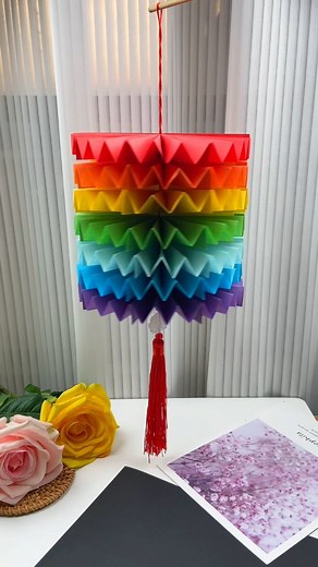 Create a mesmerizing hanging décor by crafting it from paper and adding a thread to make it spin beautifully. This simple yet elegant project is perfect for adding a touch of creativity to any space. As the décor gently twirls, it brings a dynamic and whimsical element to your room, making it a delightful piece to admire. | Paper Craft Ideas