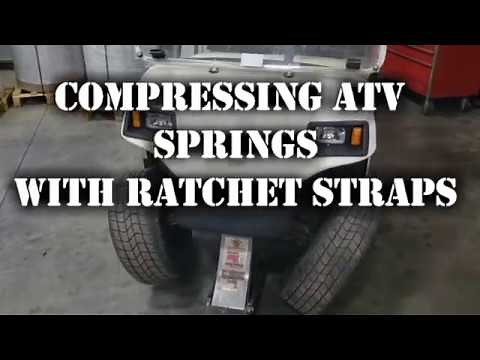Compressing ATV/Golf Cart Springs with Ratchet Straps