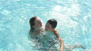Mother Teaching Swim Her Son Swimming Stock Footage Video (100% Royalty-free) 19284154 | Shutterstock