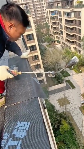 Applying Torch On Waterproofing Membrane for Roof Protection #shorts