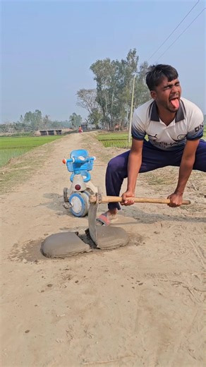 Boy clean the dirt on the street