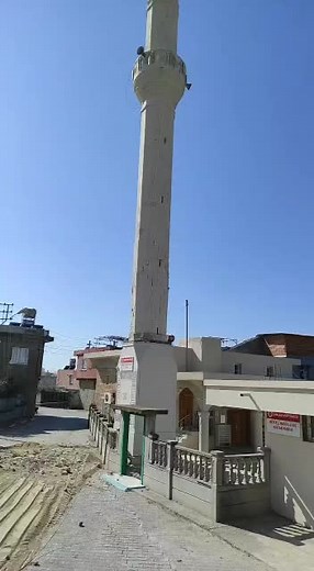 Concrete Pillar and Crane Lifting Heavy Object