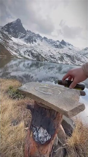 Lamb chops grilled over Swedish torches in nature _98656