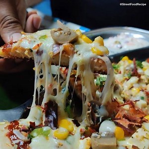 7.6M views · 48K reactions | Cheesiest Pizza Uttapam Making at Suraj Dosa, Near Reshimbagh, Nagpur | Street Food Recipes | Facebook