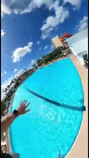 Extreme POV slide from the sky straight into the pool 😱💦 #POV #Extreme #Waterslide #Shorts