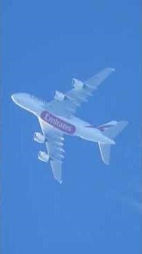 Airplane Tracing Lines Across the Open Sky