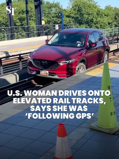 A woman in Seattle, US, drove her car onto the light rail tracks, saying she was