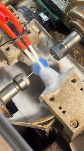 forming a marble into a circle using a tool by rotating it