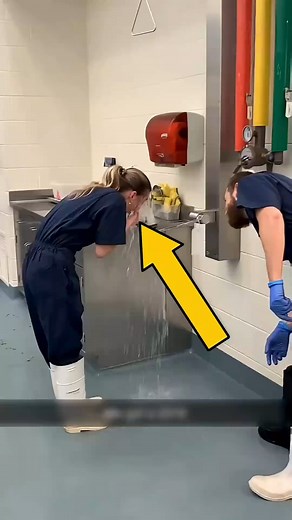 This nurse is using a special eyewash tap to clean her eyes | Aisha Gaming