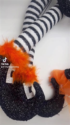 Witch With Broom Wreath Kit Two Different Styles $14.95 Black And Orange Witch Hat And Leg Decor Kit Three Piece Kit $16.95 Create a magical Halloween wreath with the help of this witch hat and leg decor kit! Featuring a glitter witch hat, striped pants and curly boots, this kit will help bring some serious creep factor to your Halloween display! Consider adding some orange and black ribbon and mesh to your wreath to add some creative depth! You may also add a Halloween sign to really seal the d