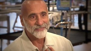 Paralyzed bride surprises wedding guests, walks down the aisle