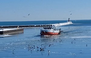 SIGNATURE TWO RIVERS VIEW: Susie Q II coming in from the big lake | Two Rivers, WI, City Hall