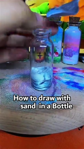 I will shake it in the end ⏳ How to draw pictures in a bottle using sand 🌷#art #drawing #sand#bottle #talent