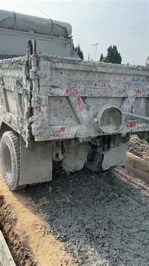 Pouring Concrete for a Rural Road : Using a Dump Truck Without Heavy Equipment