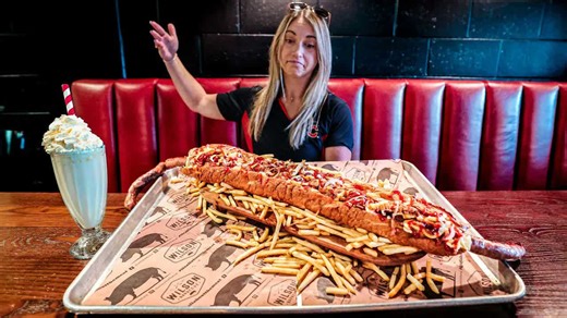 Woman attempts 1 meter long dog challenge