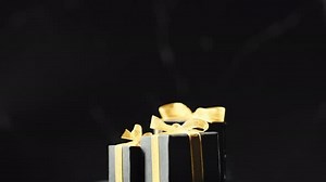 Rotating Black Gift Boxes