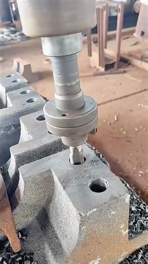 Tapping Thread Holes on a Metal Engine Block