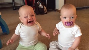 The Pacifier War I love these twin babies fighting over the pacifier so lovely @Kyoot Kids | Lookat Baby