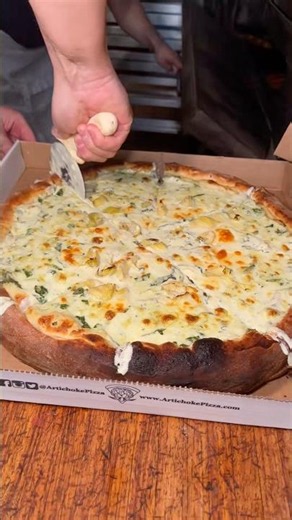 The wildly creamy and delicious ARTICHOKE PIZZA from Artichoke Pizza in NYC! 🍕🍕 #DEVOURPOWER