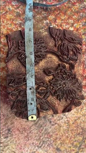 Traditional block printing using hand-carved wooden blocks is an ancient craft that involves a