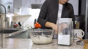 Woman making bread from scratch