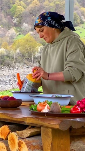 Outdoor Open-Fire Cooking: Hearty Soup Preparation