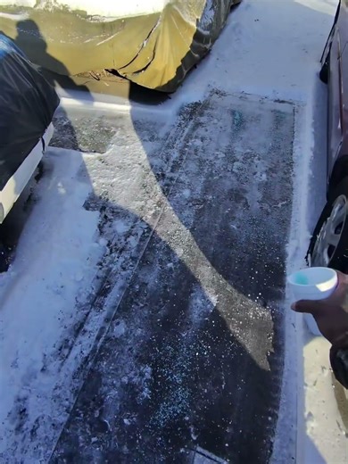 Putting salt down after using the green works shovel snowblower successfully