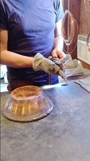 ...a little bit of me on the torch making a copper water fountain. Copper artist working; sculpting