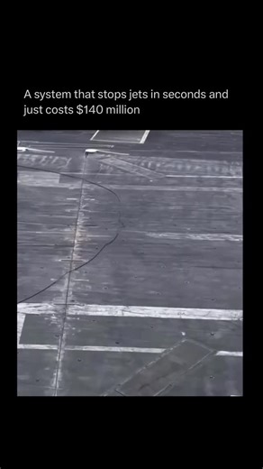 Physics Uncovered on Instagram: "An aircraft carrier’s landing system is one of those things that feels almost unreal when you think about it. It can take a fighter jet screaming in at over 150 miles per hour and bring it to a complete stop in just a few seconds. As the jet touches down, a tail hook slams into one of the thick steel cables stretched across the deck. That split second catch sends all that momentum into massive hydraulic systems hidden below, which smoothly absorb and control the