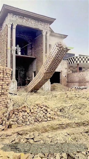 Toppling a Brick Support: How Workers Remove Temporary Construction Bracing