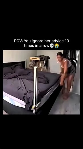 ColdOps.io on Instagram: "This Instagram Reel employs a point-of-view narrative to illustrate the consequences of persistently overlooking a partner's guidance, framed as a domestic chore unfolding in a standard urban bedroom. The video captures a woman methodically remaking a bed by tucking and smoothing dark gray sheets over the mattress, positioned near a wooden drying rack laden with clothes and a small ladder for reach, all within a compact space featuring neutral-toned walls and minimal fu