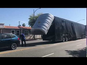 Loading A Car In An Enclosed Trailer (Global Auto Transportation)