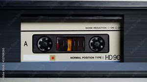 Retro radio tape recorder, audio cassette close-up. Listening to music, old radio boombox player, searching channel.