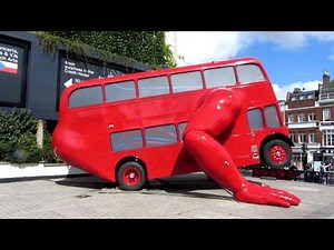 Olympics 'London Booster Bus' doing push-ups at Islington