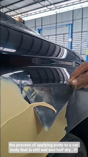 the process of applying putty to a car body that is still wet and half dry...!!!