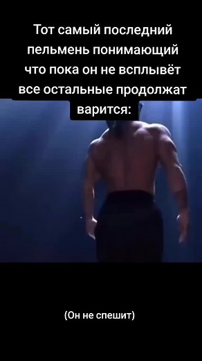 Muscular Man Dives into Deep Blue Water