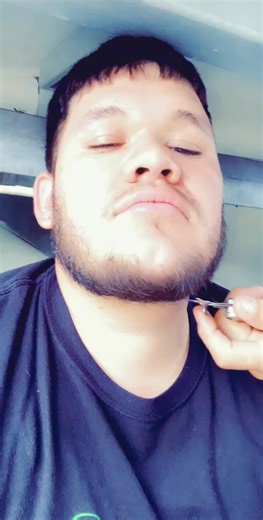 Day ??????? Need a hair cut bad so he’s using his Leatherman utility knife 😅😅#beardtrim