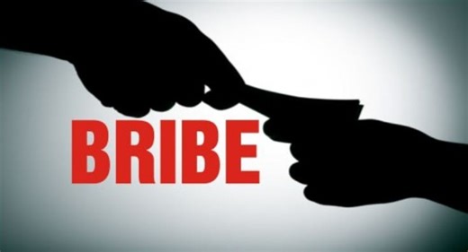 Assam: Excise official caught taking bribe in Guwahati city