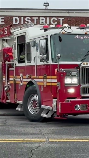 Bethpage Fire Department Ladder 3 responding mutual aid to Syosset